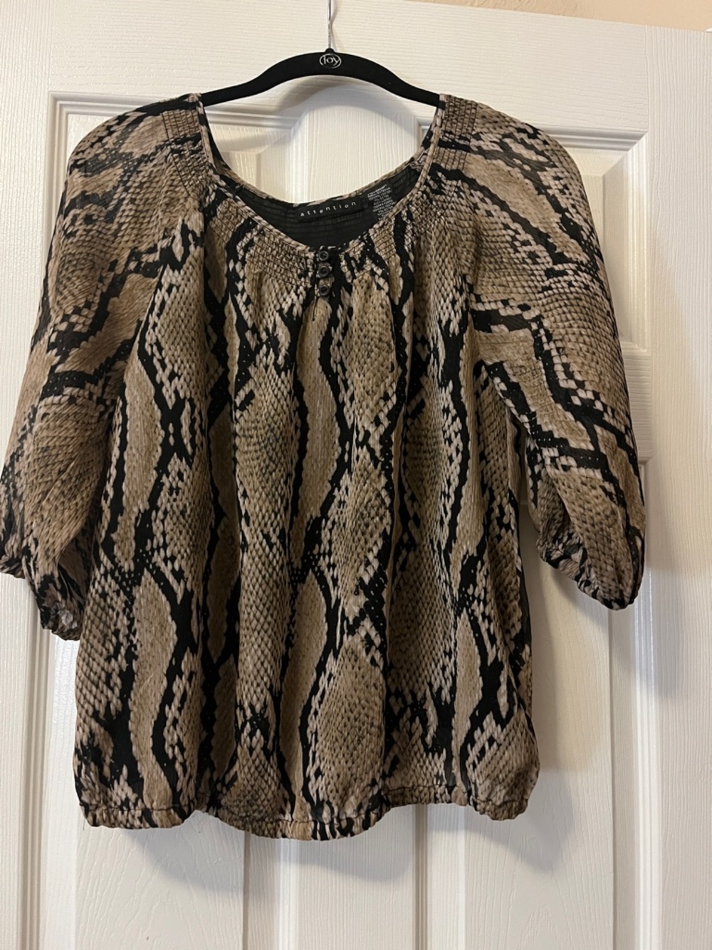 Woman’s Snake patterned top